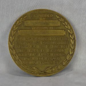 pussnboots-medal-back