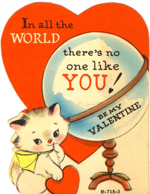 Cartoon cat standing next to a globe with the caption "In all the WORLD there's no one like YOU! Be my Valentine"