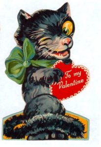 Creepy black cartoon cat valentine. holding a heart-shaped card that reads "To my Valentine"