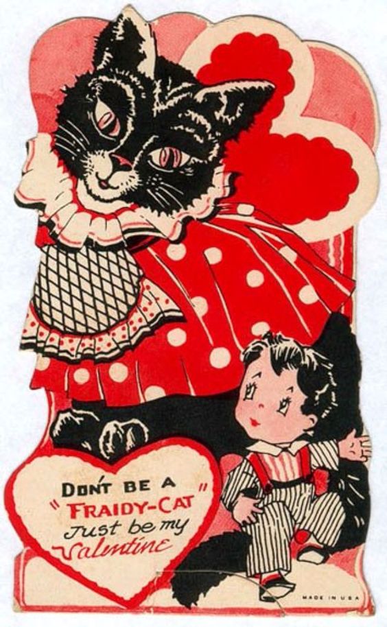 Vintage cartoon large black cat dressed in a red polka dot dres. Little boy looks up at her. Caption reads "DON'T BE A 'FRAIDY-CAT' JUST BE MY VALENTINE"