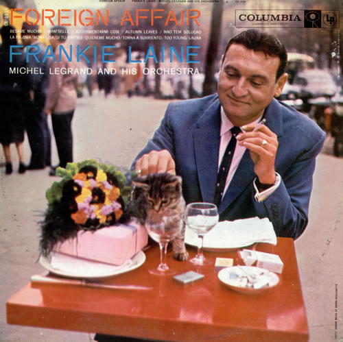 Frankie Laine Foreign Affair album cover featuring Laine petting a cute kitten