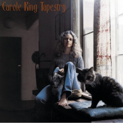Carole King's Tapestry album - Carole King sits in a sunlit window with her cat Telemachus